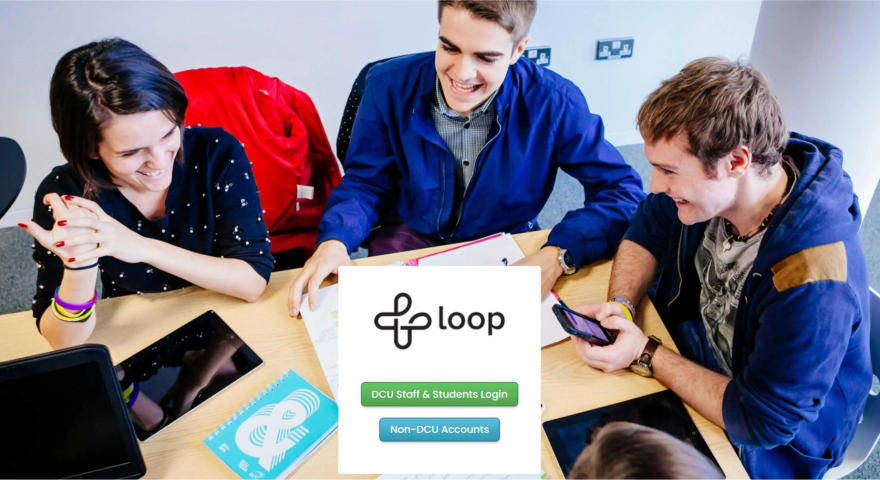 Screenshot of the login page for Dublin City University login page with an image of several people smiling and sitting around a table with a computer and notebooks 