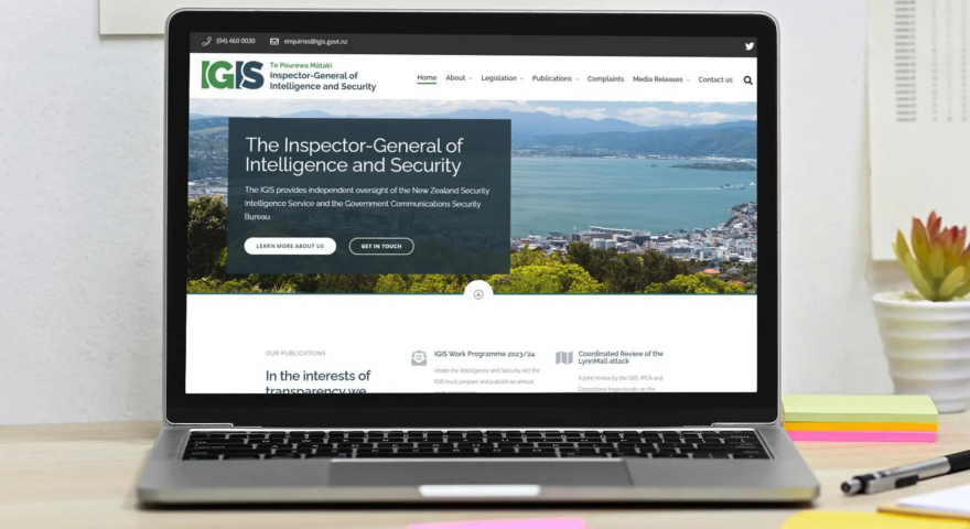 Laptop open on the IGIS Inspector General of Intelligence and Security homepage with the options to learn more or get in touch
